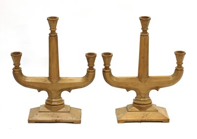 Lot 98 - A pair of fruitwood three-branch candelabra