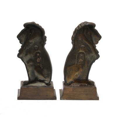 Lot 229 - A pair of lion fire dog ornaments