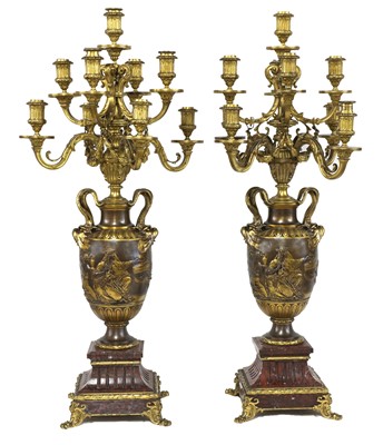 Lot 10 - A pair of marble, gilt and patinated bronze candelabra