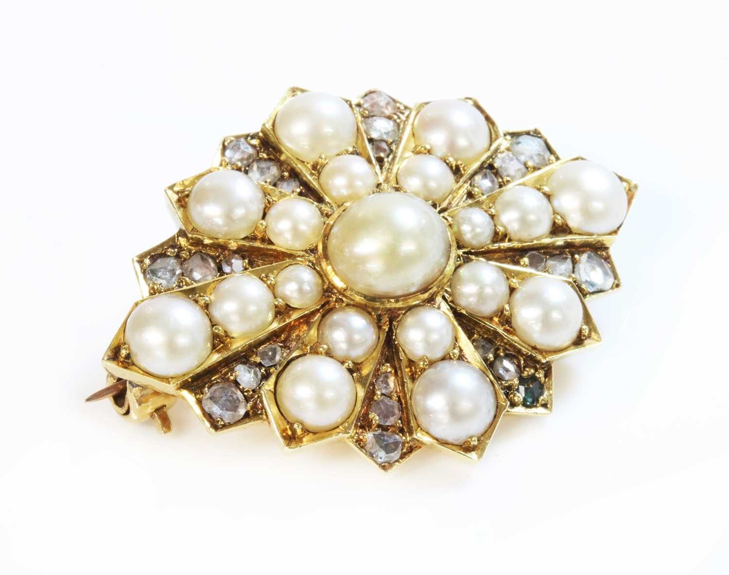 Lot 98 - A Victorian gold split pearl and diamond star brooch or motif