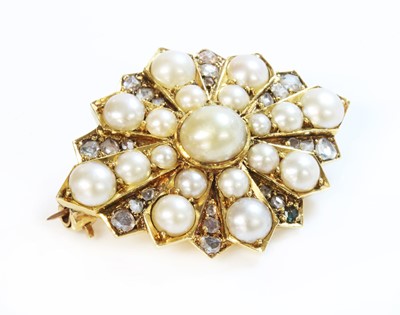 Lot 98 - A Victorian gold split pearl and diamond star brooch or motif