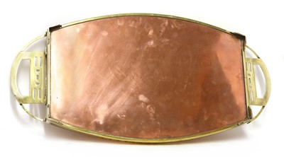 Lot 84 - A Secessionist copper and brass oval tray