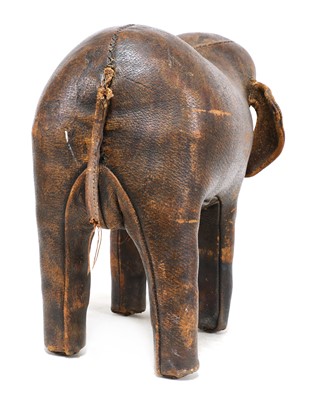 Lot 554 - A leather elephant footstool