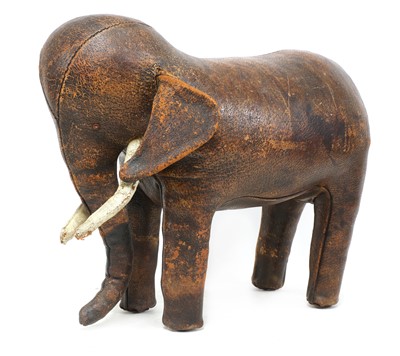 Lot 554 - A leather elephant footstool