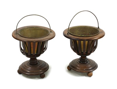 Lot 582 - A pair of 20th century inlaid mahogany baskets