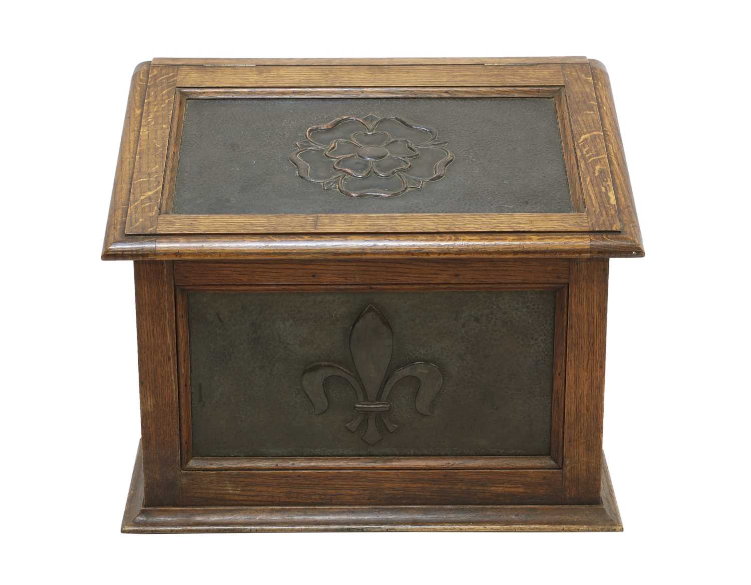 Lot 43 - An Arts and Crafts oak and copper-mounted log bin