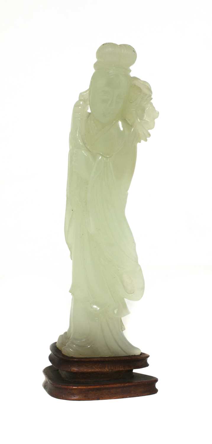 Lot 91 - A Chinese jade figure