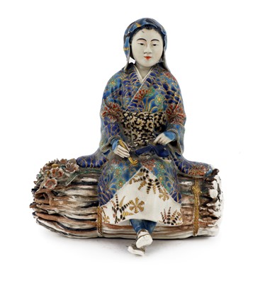 Lot 198 - A Japanese Satsuma ware figure