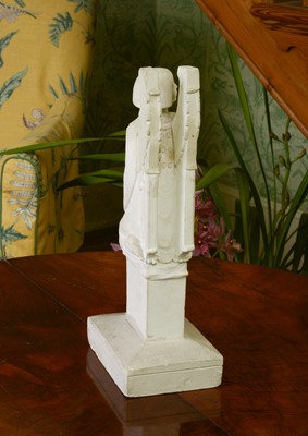 Lot 44 - A plaster figure of a kneeling angel