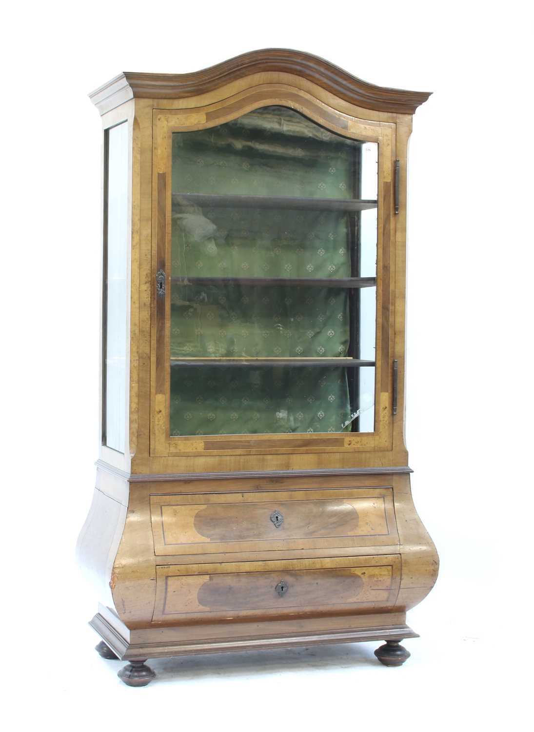 Lot 357 - A German inlaid walnut display cabinet