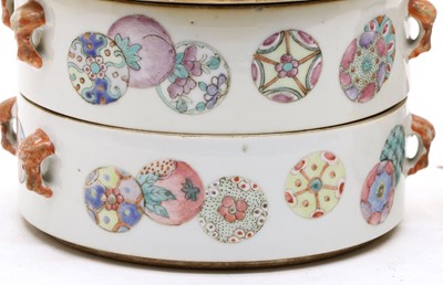 Lot 212 - A Chinese famille rose porcelain four stack food container