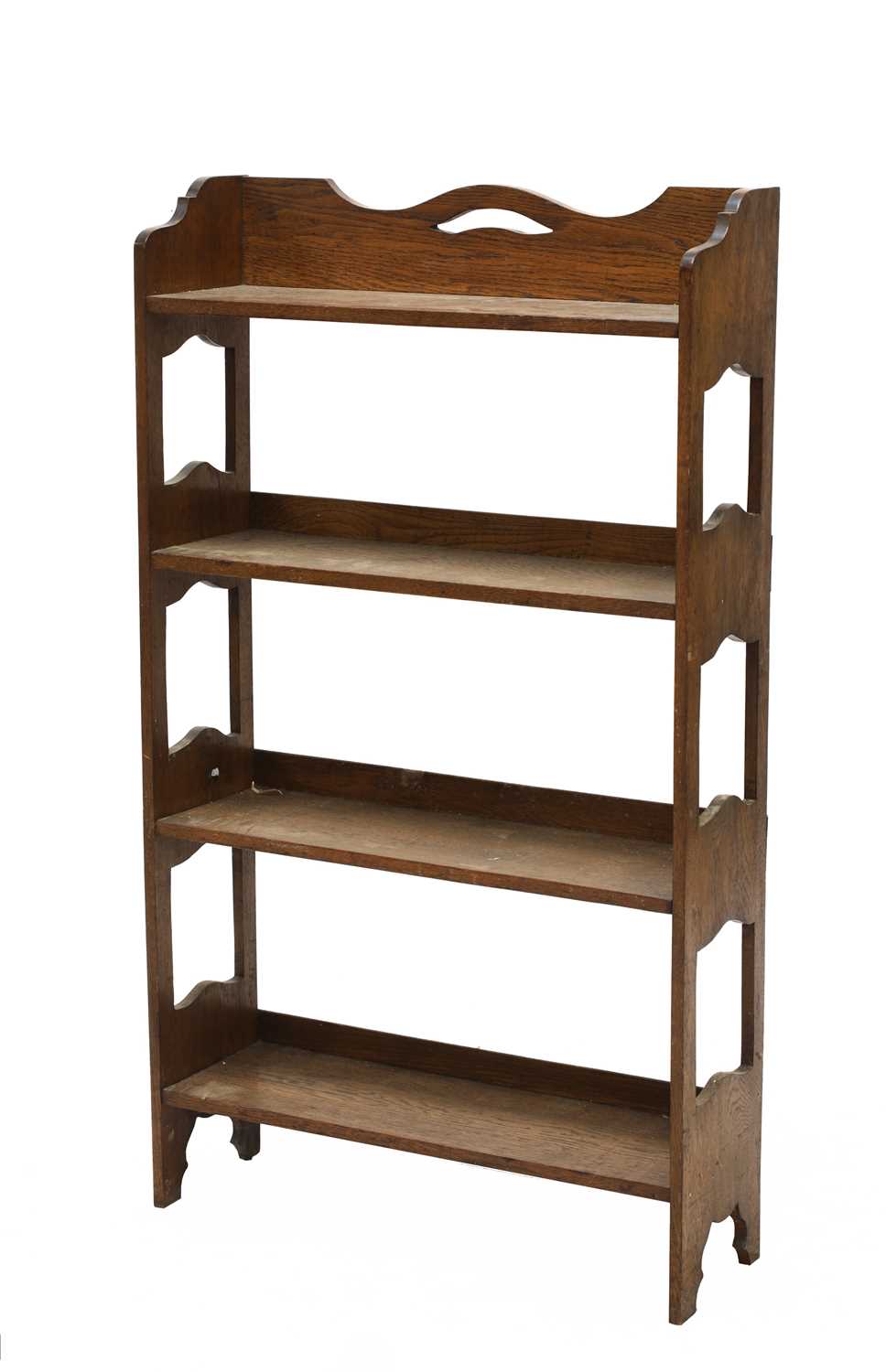 Lot 31 - An Arts and Crafts oak free-standing set of shelves