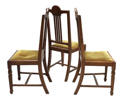 Lot 23 - A set of six oak dining chairs