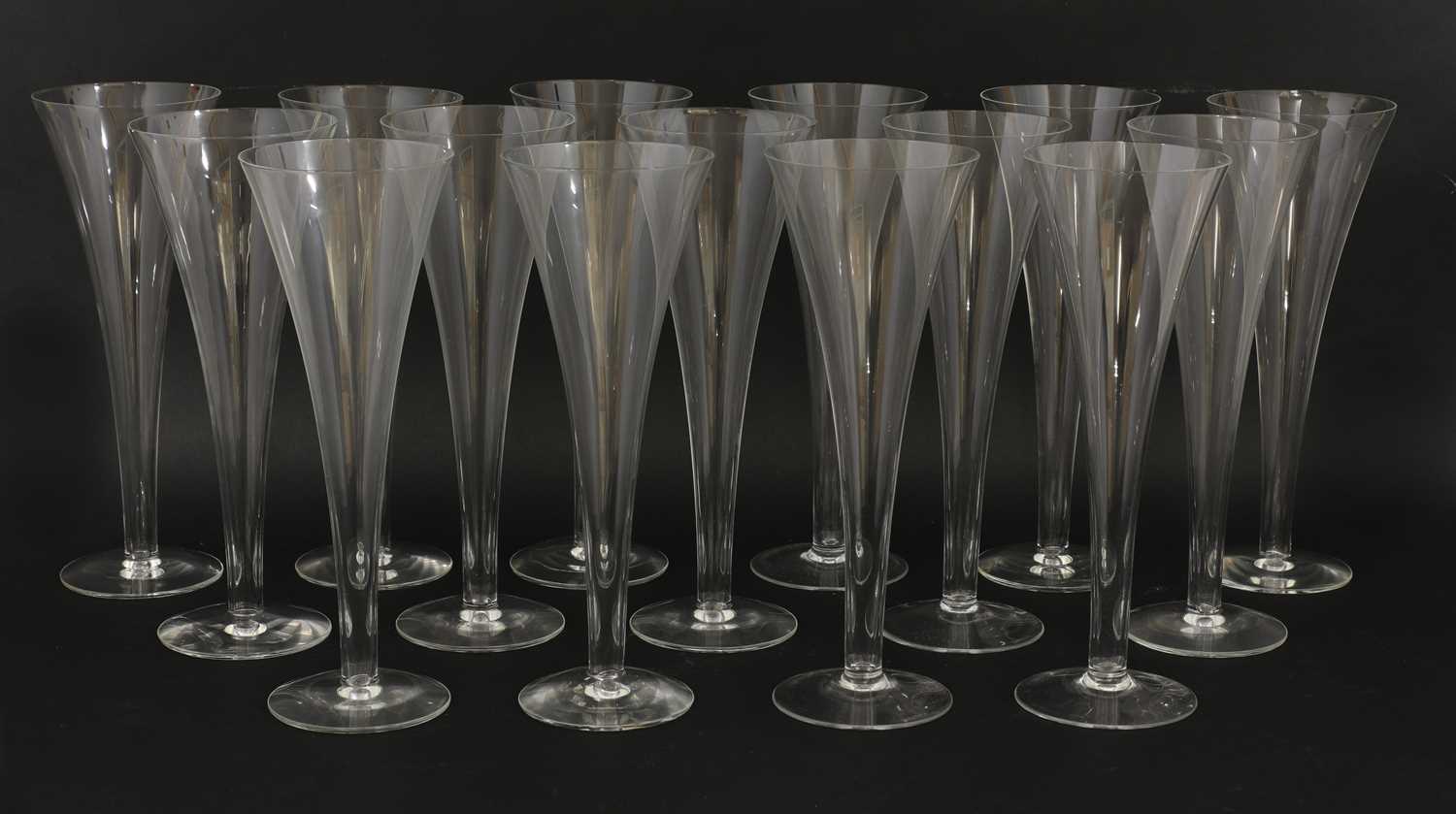 Lot 540 - A set of fifteen modern champagne flutes