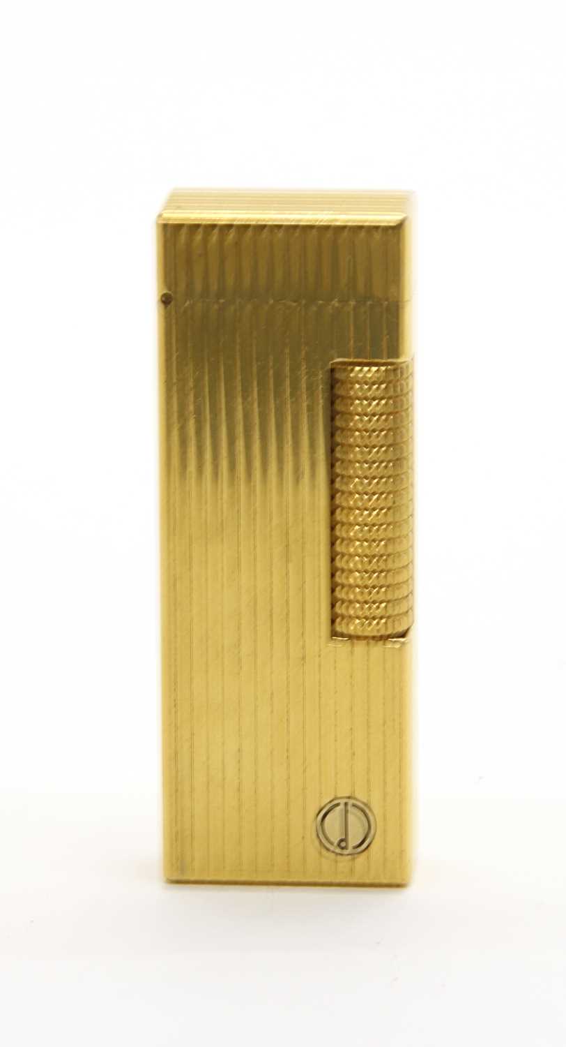 Lot 21 - A rolled gold Dunhill lighter