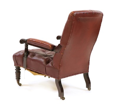 Lot 322 - A Victorian red leather button back armchair