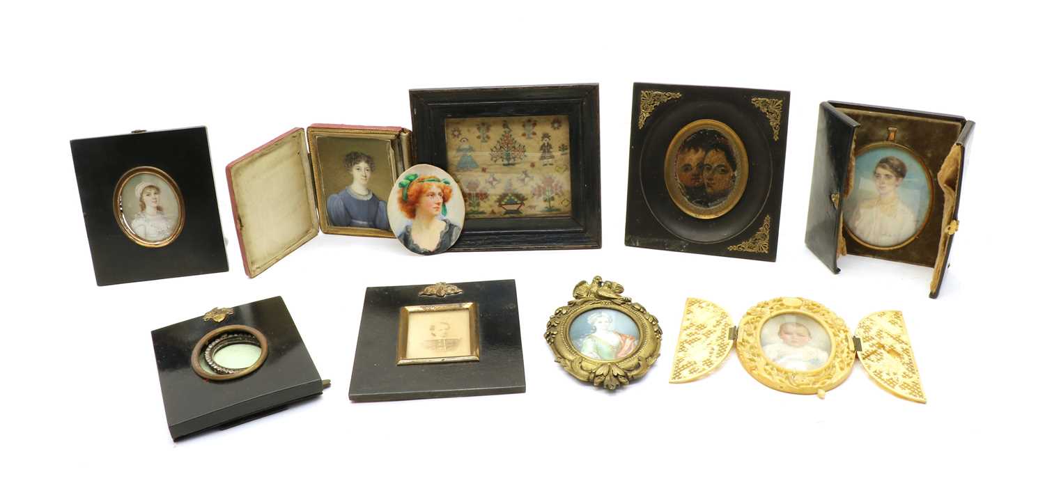 Lot 261 - A small group of ivory portrait miniatures