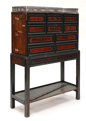 Lot 908 - An Indo-Portuguese ebony, tortoiseshell and kingwood cabinet on stand