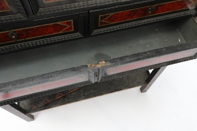 Lot 908 - An Indo-Portuguese ebony, tortoiseshell and kingwood cabinet on stand