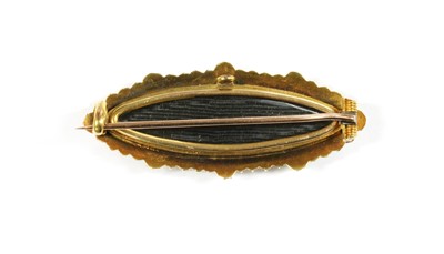 Lot 5 - A Victorian gold onyx and split pearl brooch