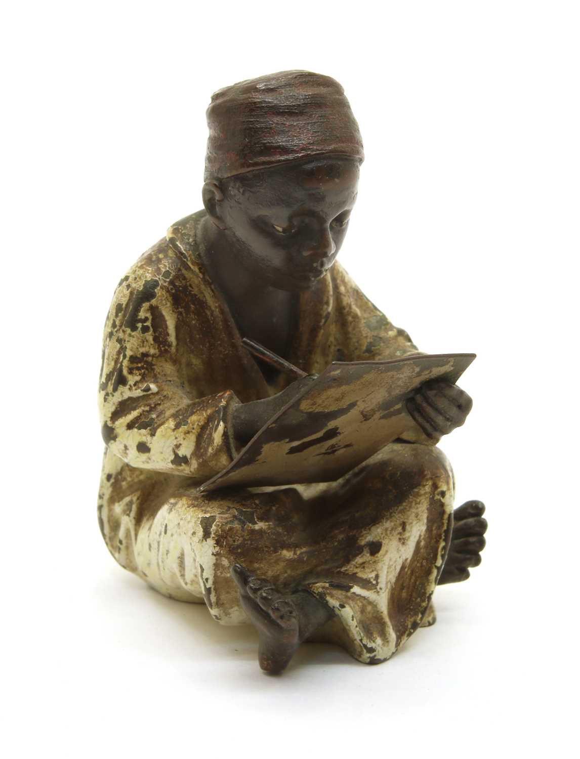 Lot 128 - A cold painted bronze of an arab boy