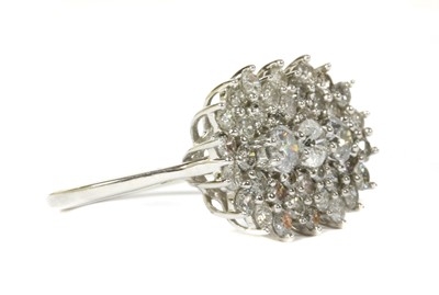 Lot 84 - A white gold diamond cluster ring