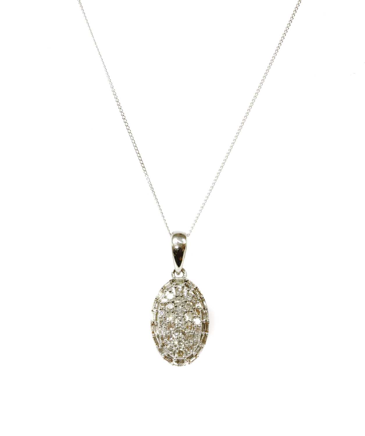 Lot 100 - A white gold diamond cluster pendant