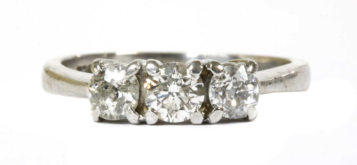 Lot 81 - A 9ct white gold three stone diamond ring