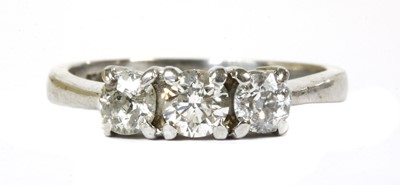 Lot 81 - A 9ct white gold three stone diamond ring