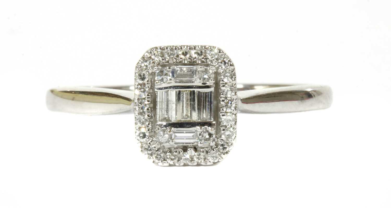 Lot 97 - A white gold diamond cluster ring