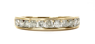 Lot 128 - A gold diamond half eternity ring