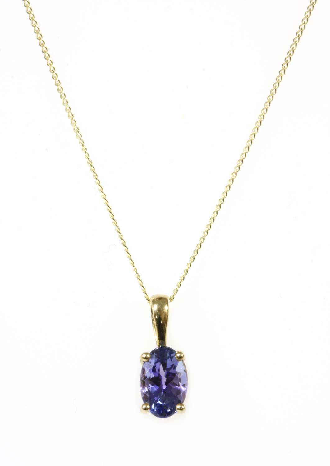 Lot 165 - A gold single stone tanzanite pendant