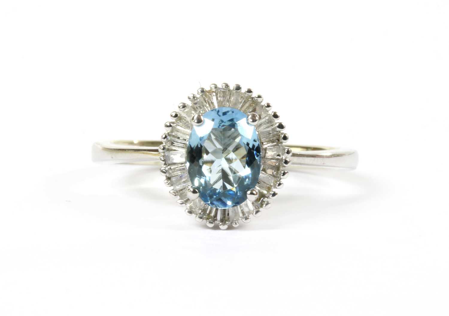 Lot 261 - A white gold aquamarine and diamond cluster ring