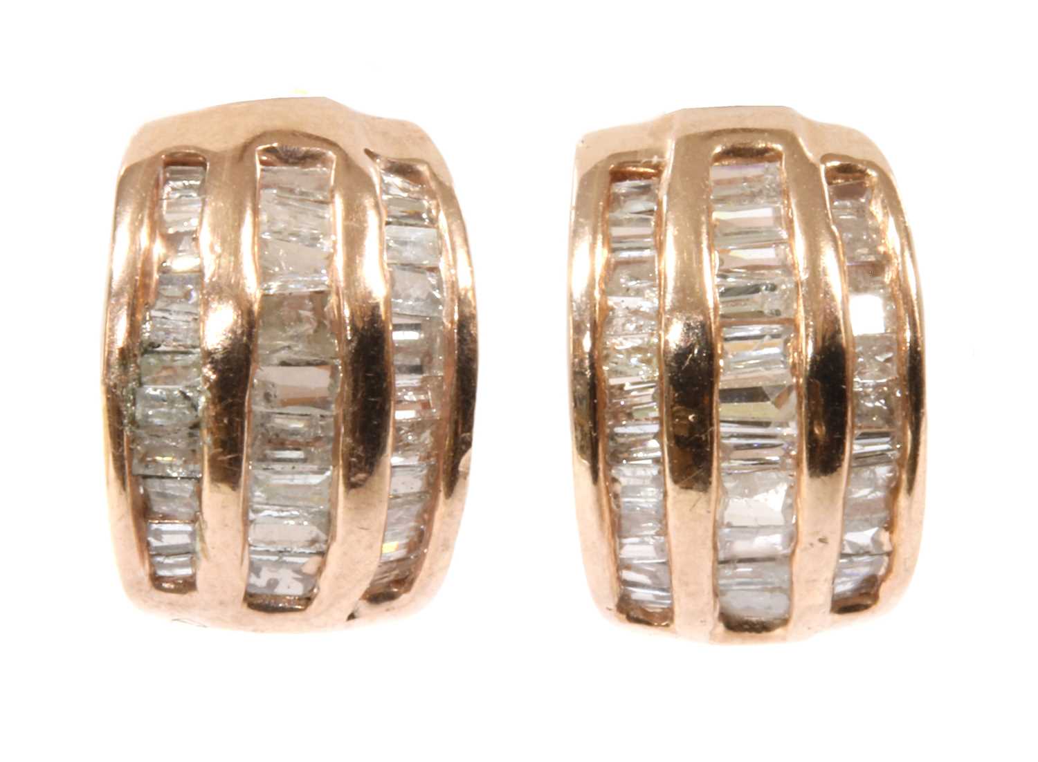 Lot 162 - A pair of silver rose gilt diamond earrings