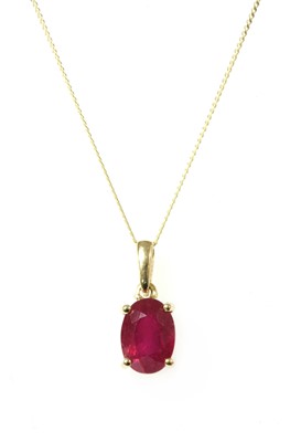 Lot 130 - A gold single stone ruby pendant