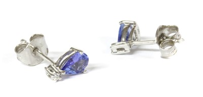 Lot 164 - A pair of white gold tanzanite and diamond stud earrings