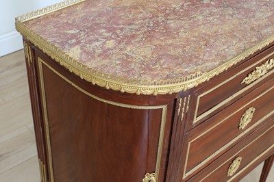 Lot 46 - A French Louis XVI-style mahogany and ormolu mounted commode
