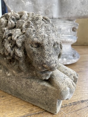 Lot 392 - A pair of composite stone lions