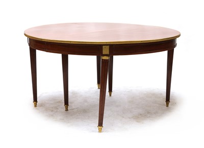 Lot 232 - A French Louis Philippe mahogany and gilt metal mounted dining table