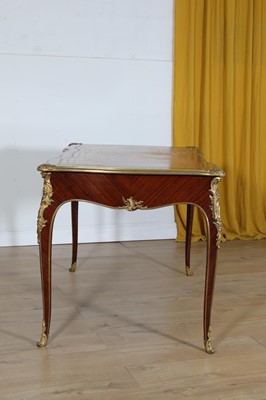 Lot 15 - A French Louis XV-style kingwood and ormolu mounted bureau plat