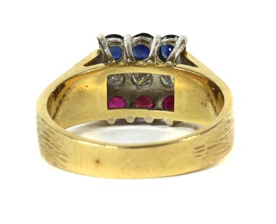 Lot 135 - An 18ct gold ruby, diamond and sapphire ring, c.1980