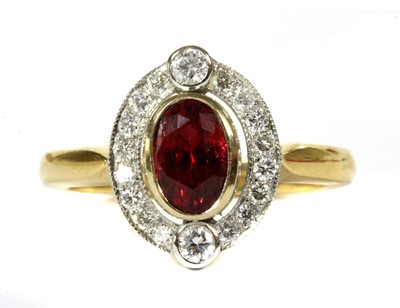Lot 184 - A gold red spinel and diamond cluster ring
