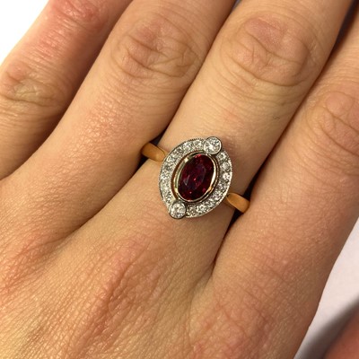 Lot 184 - A gold red spinel and diamond cluster ring