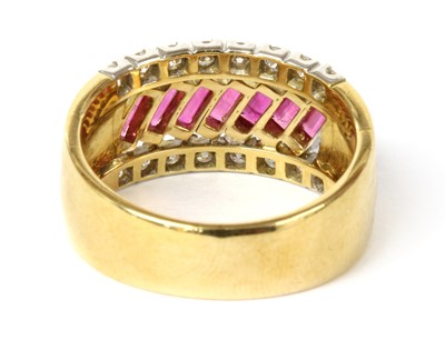 Lot 1214 - A gold ruby and diamond ring