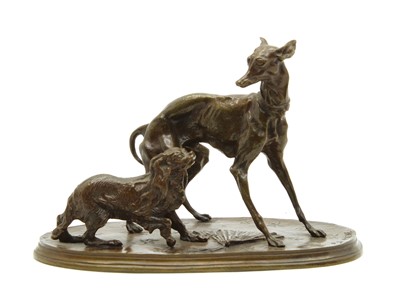 Lot 145 - A bronze model of a whippet and a King Charles spaniel