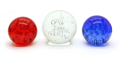 Lot 274 - Various glass items, comprising: three spherical bubbled doorstops