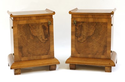 Lot 152A - A pair of Art Deco walnut bedside cupboards