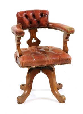 Lot 377 - A revolving desk walnut chair