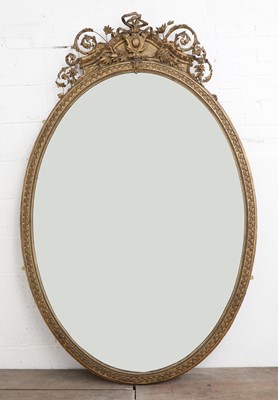Lot 57 - A large gilt overmantel mirror