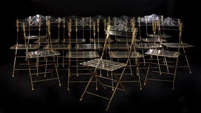 Lot 426 - A set of eighteen Lucite and gilt metal folding chairs